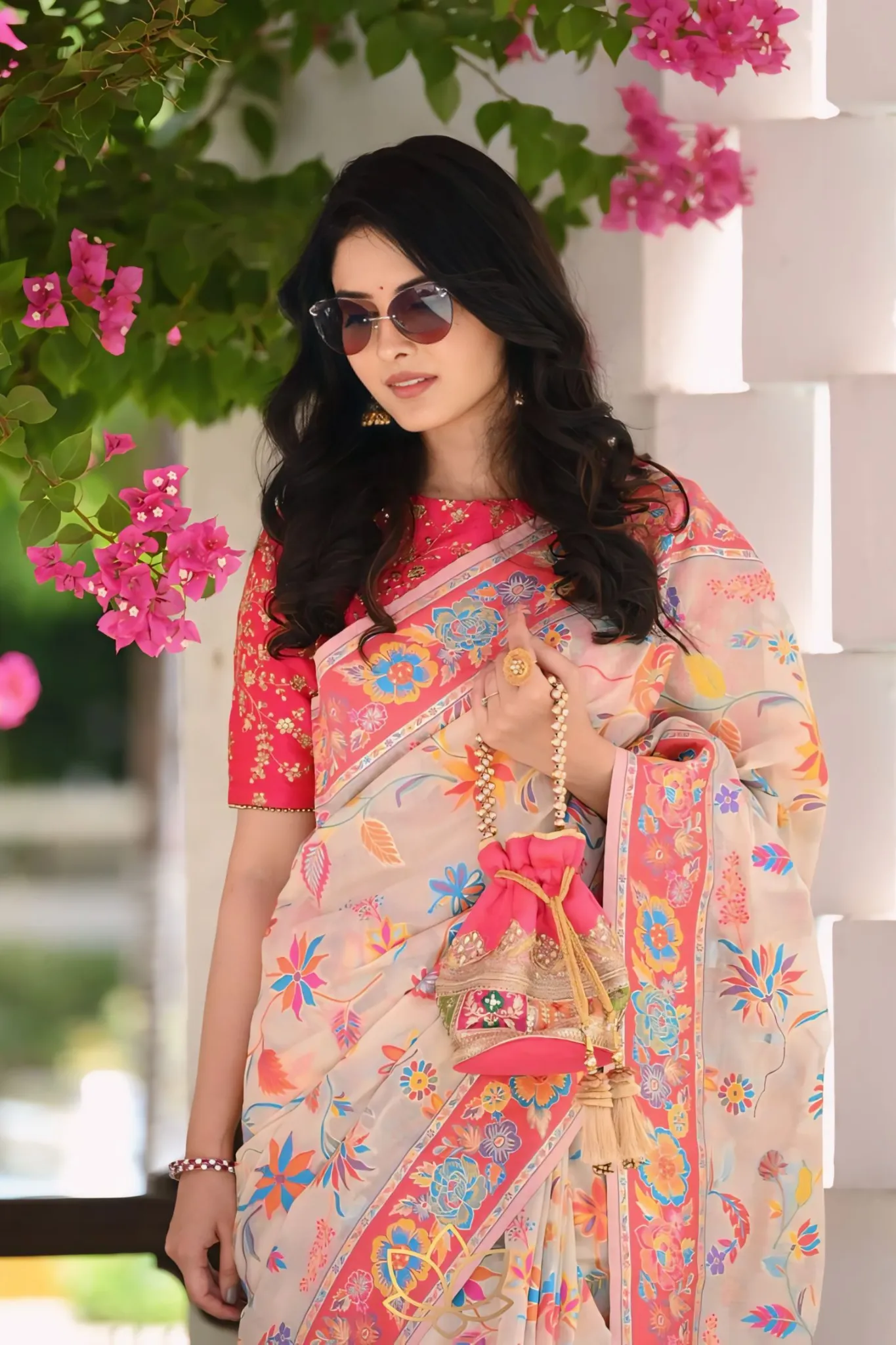 A SAREE ADORNED IN MULTICOLORE FLOWERS