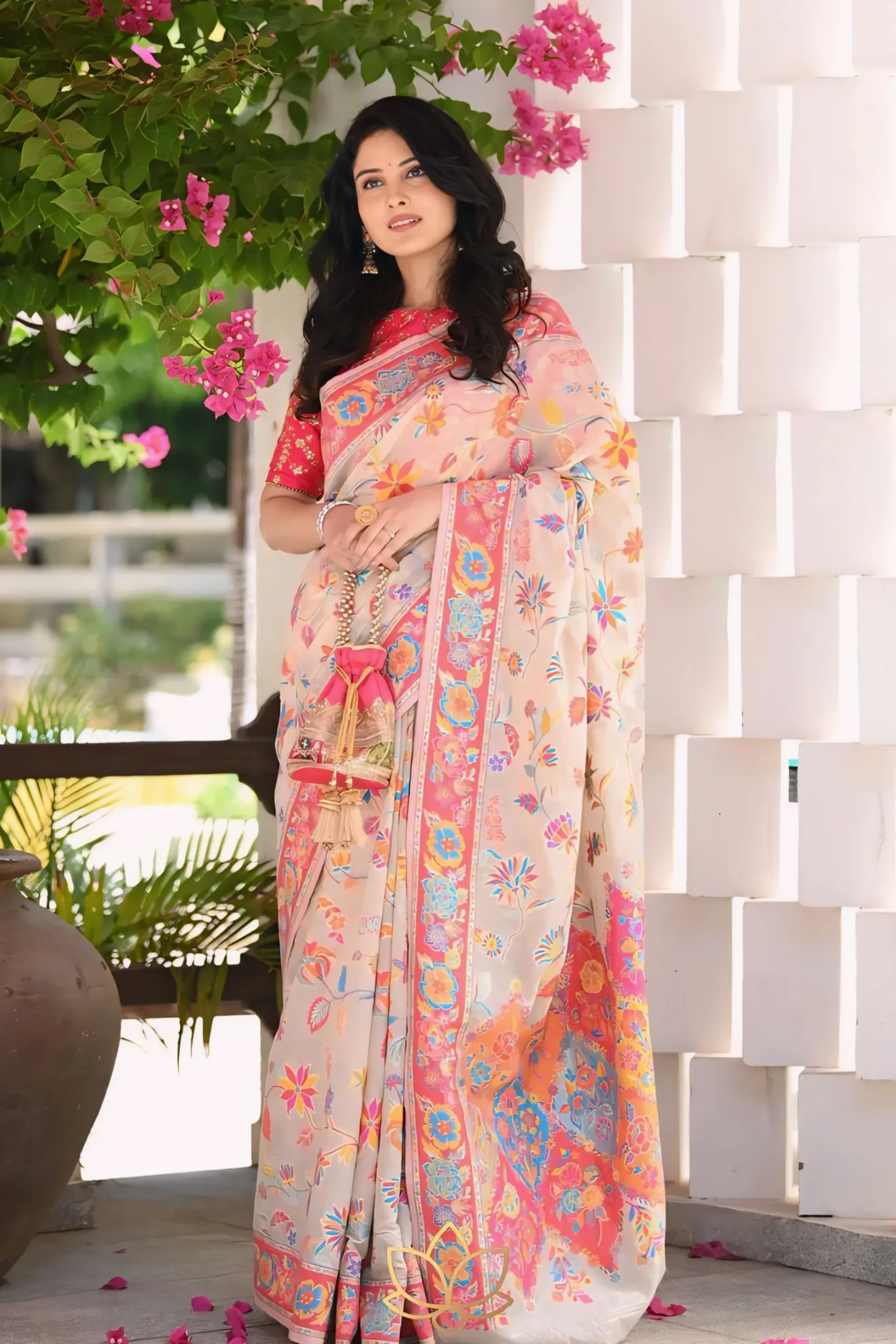 A SAREE ADORNED IN MULTICOLORE FLOWERS