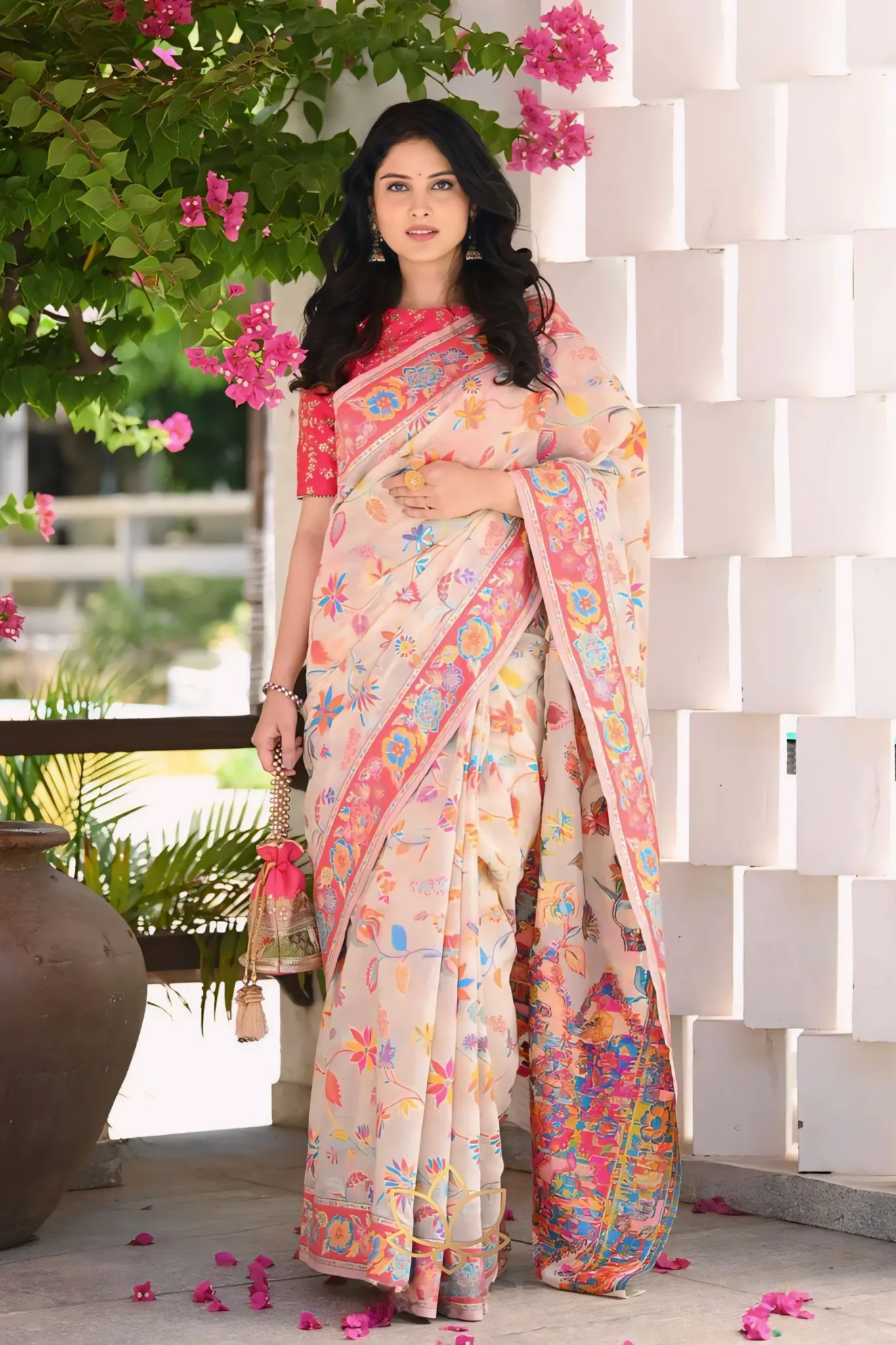 A SAREE ADORNED IN MULTICOLORE FLOWERS