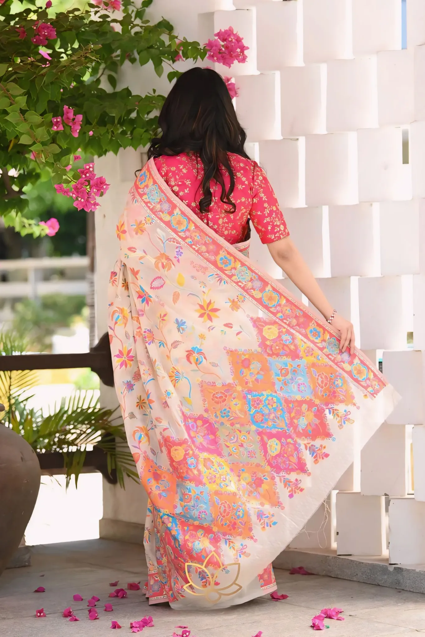 A SAREE ADORNED IN MULTICOLORE FLOWERS